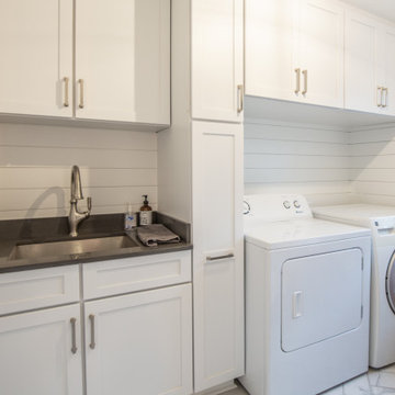 Even the laundry room was given a facelift. The cabinets around the washer and