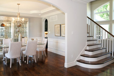 Foyer - mid-sized craftsman medium tone wood floor and brown floor foyer idea in St Louis