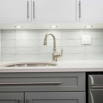 Grey Kitchen with Crystile Wave Backsplash