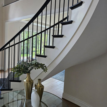 Project #130 | Curved Staircase with Wraparound Balcony