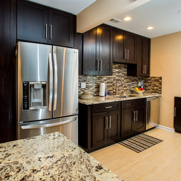 Contemporary Espresso Kitchen Remodel with Granite Counters & Mosaic Backsplash