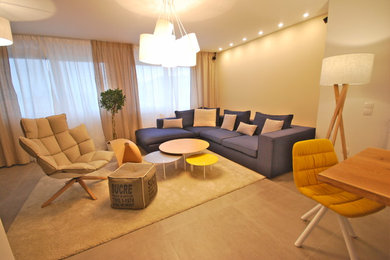Example of a trendy formal and loft-style ceramic tile living room design in DC Metro with beige walls