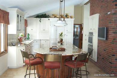 Inspiration for a small timeless l-shaped travertine floor eat-in kitchen remodel in Bridgeport with beaded inset cabinets, white cabinets, granite countertops, an island, an undermount sink, white backsplash, porcelain backsplash and white appliances