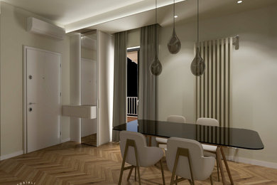 Example of a mid-sized trendy open concept living room design in Milan