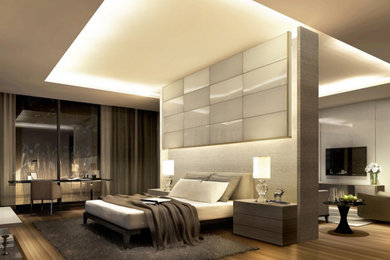 Bedroom - large contemporary master medium tone wood floor and vaulted ceiling bedroom idea in Denver with beige walls and no fireplace