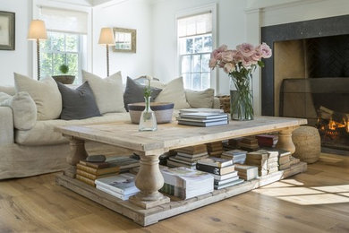 Light wood floor living room photo in New York