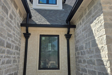 Inspiration for a large contemporary exterior home remodel in Dallas