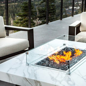 Montecito fire pit table in Dekton Aura with Balboa Lounge Chairs