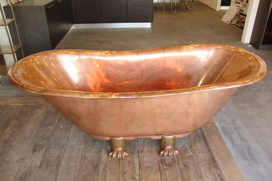 A true masterpiece hand cast copper bathtub.