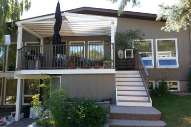 Example of a classic exterior home design in Calgary