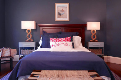 Example of a transitional bedroom design in Boston