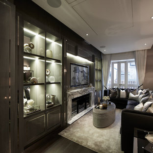 Design ideas for a contemporary home cinema in London with dark hardwood flooring and a built-in media unit.