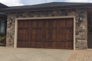 Garage - mid-sized craftsman attached two-car garage idea in Other