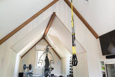 Example of an arts and crafts home gym design in Other