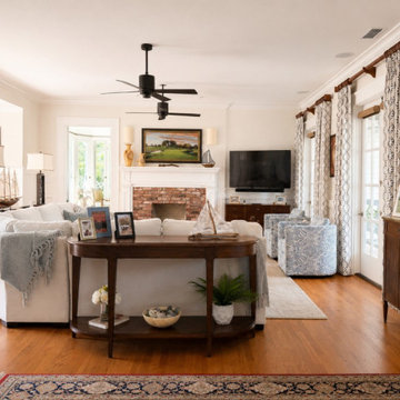 Living Room with brick fireplace