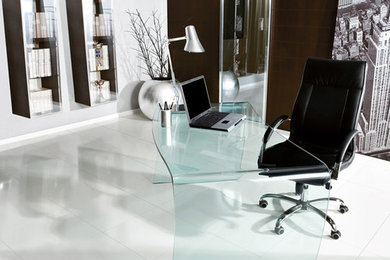Inspiration for a mid-sized contemporary freestanding desk home office remodel in Miami with brown walls