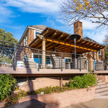 Elevated Curved Deck with Roof Extension Arbor