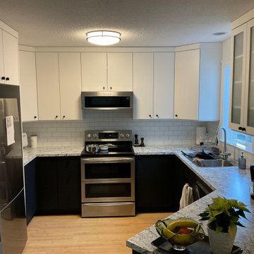 Black and white kitchen with modern cabinet