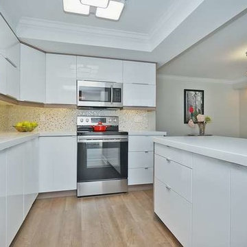 Condo kitchen counter top. Pure White Quartz.