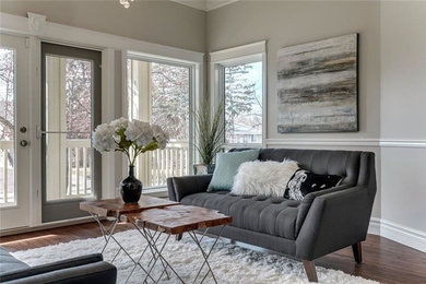 Design ideas for a transitional living room in Calgary.