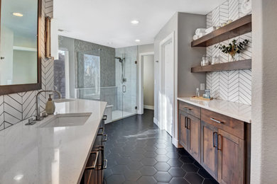 Inspiration for a contemporary black floor and double-sink walk-in shower remodel in Denver with an undermount sink and a hinged shower door