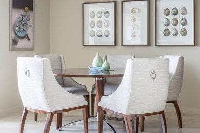 Large trendy ceramic tile and beige floor enclosed dining room photo in New York with beige walls and no fireplace