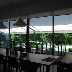 Alutex Cape Code Awnings over gorgeous sliding kitchen doors. - Awnings