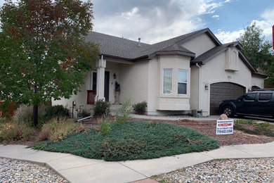 Inspiration for a timeless exterior home remodel in Denver