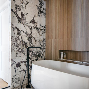 Organic Modern Bathroom with Calacatta Viola Marble