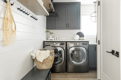 Inspiration for a contemporary laundry room remodel in Vancouver