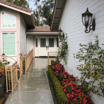 Landscape, Gate, and Sloped Sidewalk