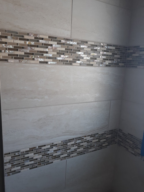 Should I tile up to the ceiling above vanity?