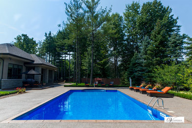 Minimalist pool photo in Toronto