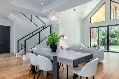 Example of a minimalist dining room design in Vancouver
