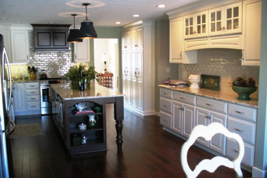 Example of a classic kitchen design in Other