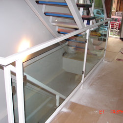 Steel stairs with glass panel - Products
