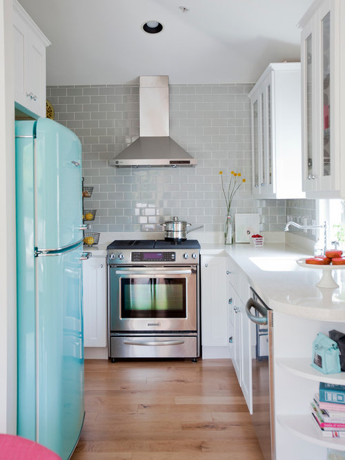 Eclectic Kitchen Vancouver Eclectic u-shaped kitchen idea in Vancouver with glass-front cabinets, white cabinets