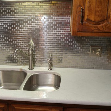 London Grey Caesarstone with Stainless Steel Backsplash