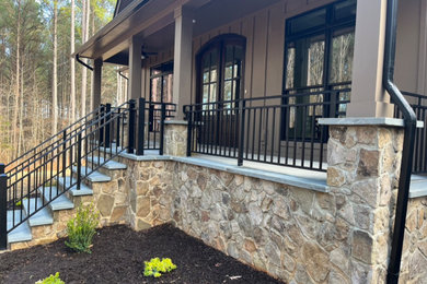 This is an example of a cottage porch design in Richmond.