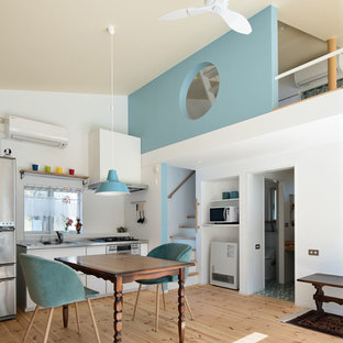 他の地域のエクレクティックスタイルのおしゃれなダイニングの写真