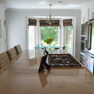 Kitchen Remodel with White Copenhagen Cabinetry and White Macauba Quartzite Tops