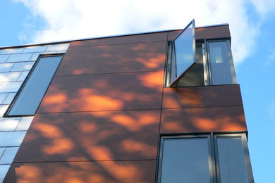 Example of a minimalist exterior home design in New York