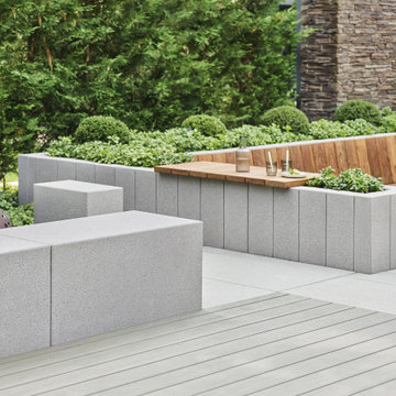 Moderne Sitzecke aus Holz und Beton