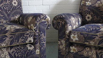 Armchairs upholstered in Morris and Co Larkspur