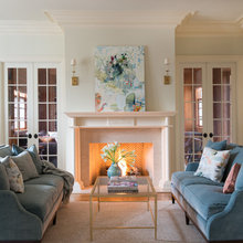 den with teal sofas