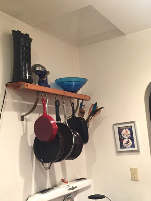 vented hood thru ceiling, attic and roof worth the cost?