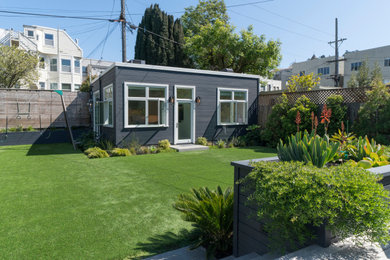 Inspiration for a french country gray one-story flat roof remodel in San Francisco