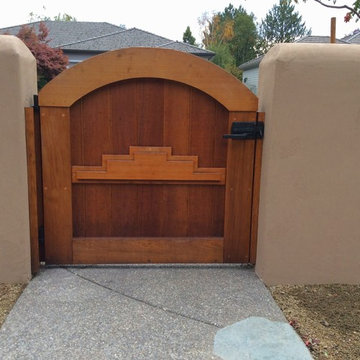 Spanish Style Home Design with Wooden Gate Yard Side