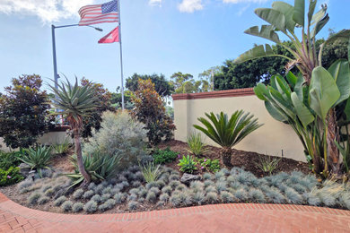 Inspiration for a mid-sized mediterranean partial sun front yard raised garden bed in San Diego.