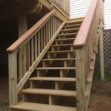 Presure treated deck with cedar cap rail and, privacy lattice